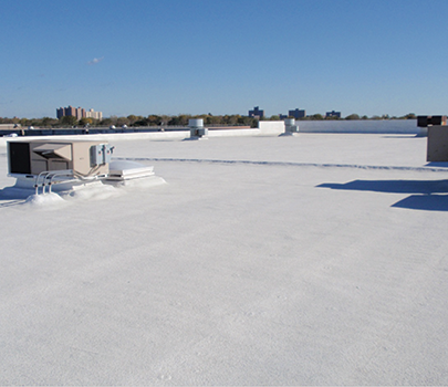 white cool roof coating and spray foam